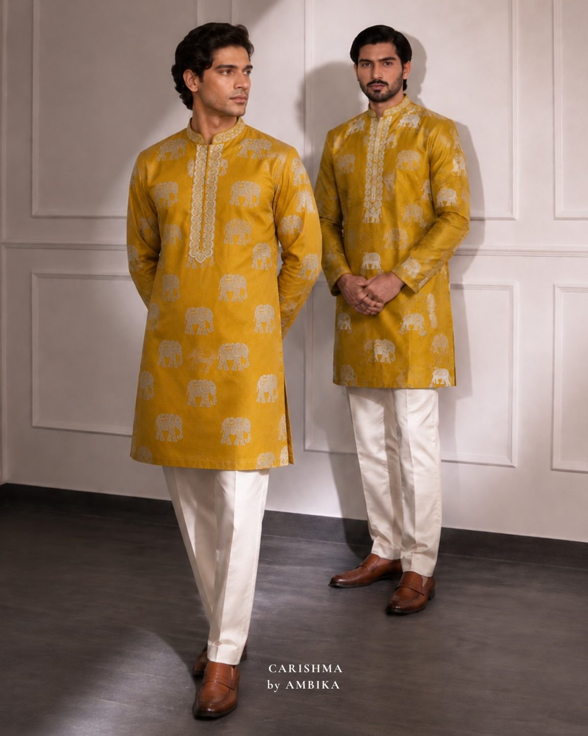 Two mustard kurtas with elephant motifs