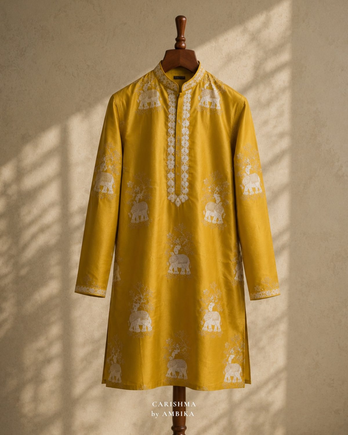 Mustard kurta with elephant motifs, side view